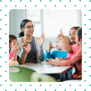 Teacher working with a table full of students